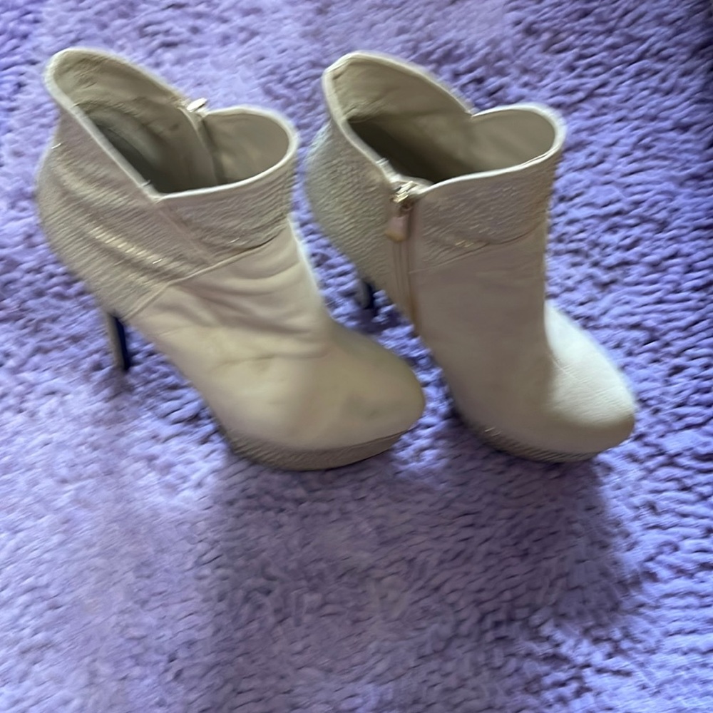 Cream color platform ankle boots. Only worn twice.